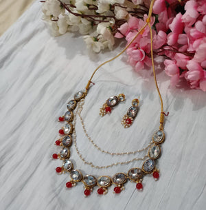 oval kundan necklace with red beads